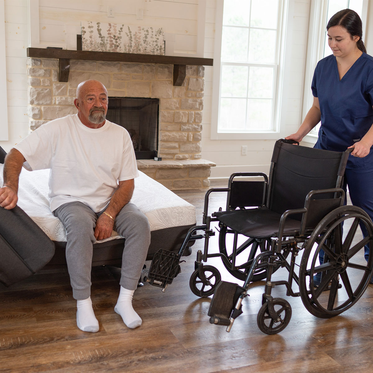 Flexabed Hi-Low adjustable bed lowered to wheelchair height for transfer